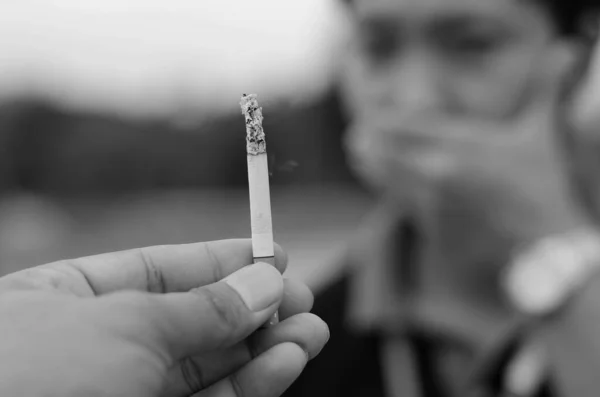 Man Smelly Cigarette Another Man Filed — Stock Photo, Image