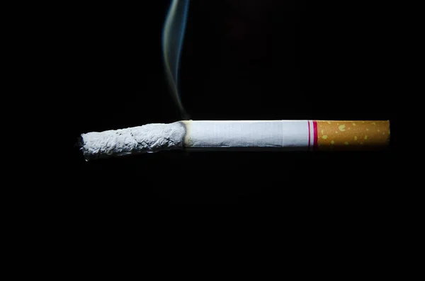 Puha Háttérrel Rendelkező Cigaretta Sötét — Stock Fotó