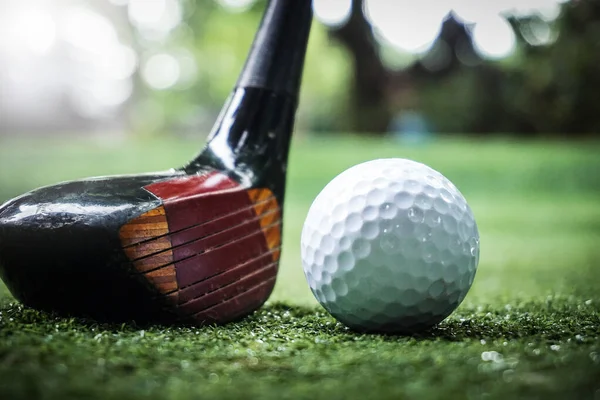 Golf club and golf ball, close up