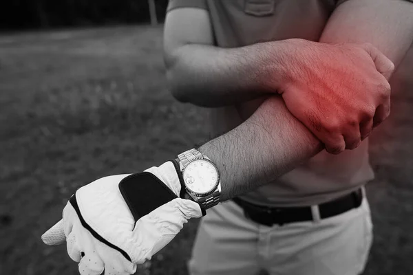 Golfer Hand Holding Stick Another Hand Arm Arm Hurts — Stock Photo, Image