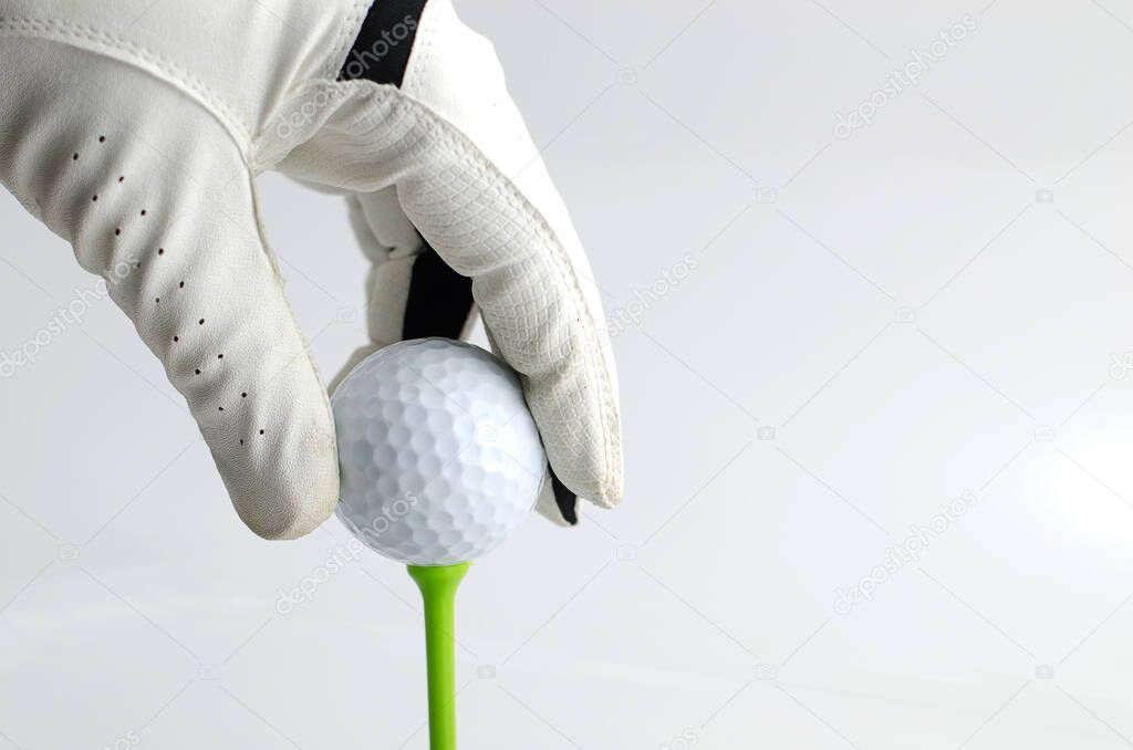 Golf. Golfer's hand with ball. Sport