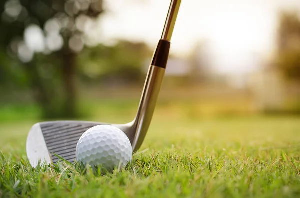 Golf club and golf ball, close up