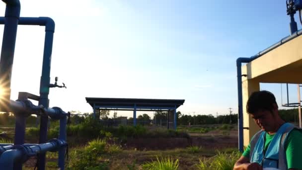 Asian Engineer Working Sewage Treatment Systems Footage — Stock Video