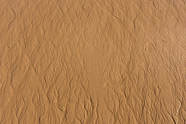 Rippel texturer i sanden vid solnedgången — Stockfoto