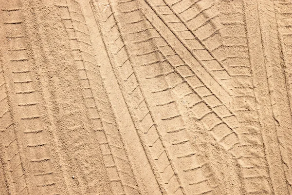 Tire tracks on the sand — Stock Photo, Image