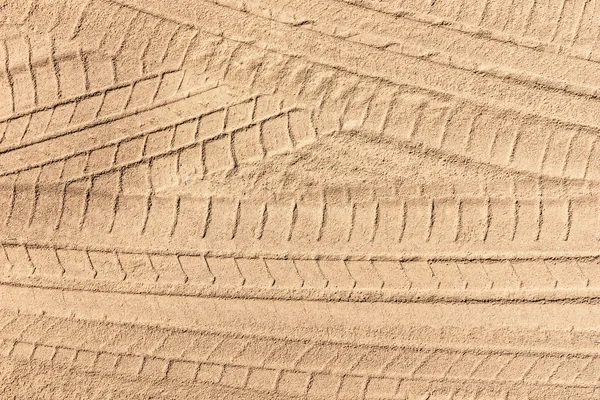 Däckspår på sanden — Stockfoto