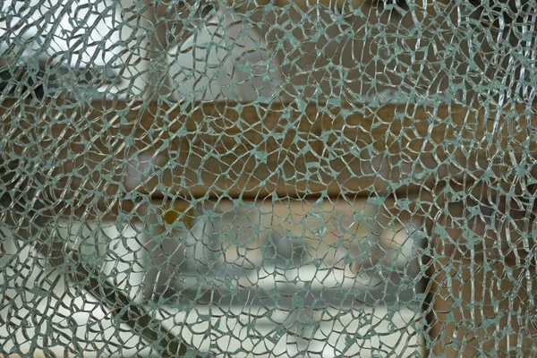 Vidrio roto con pequeñas grietas — Foto de Stock