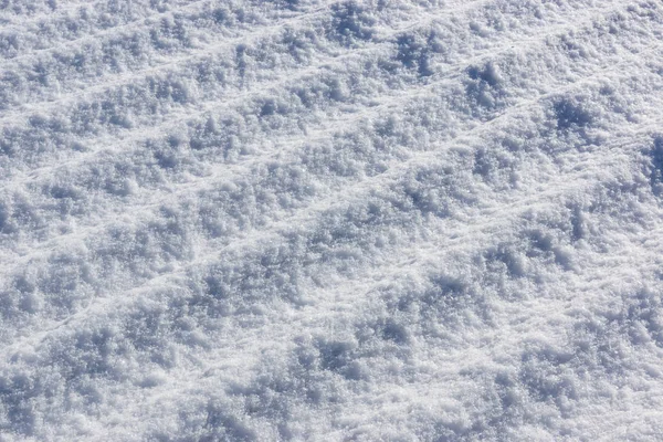 Textura corrugada de nieve. Nieve en el techo — Foto de Stock