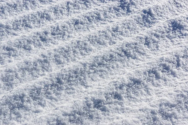 Textura corrugada de nieve. Nieve en el techo —  Fotos de Stock