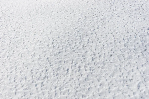 Primer plano de la textura de la superficie de nieve —  Fotos de Stock