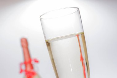 Closeup of a filled champagne glass clipart