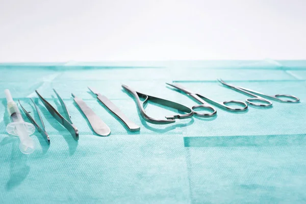 Set of surgical instruments on gauze