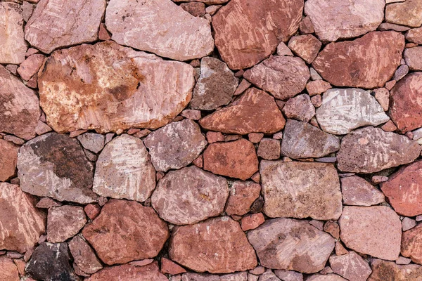 빨간 자연적인 돌 벽 배경 — 스톡 사진