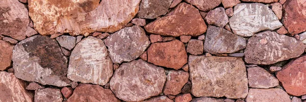 빨간 자연적인 돌 벽 배경 — 스톡 사진