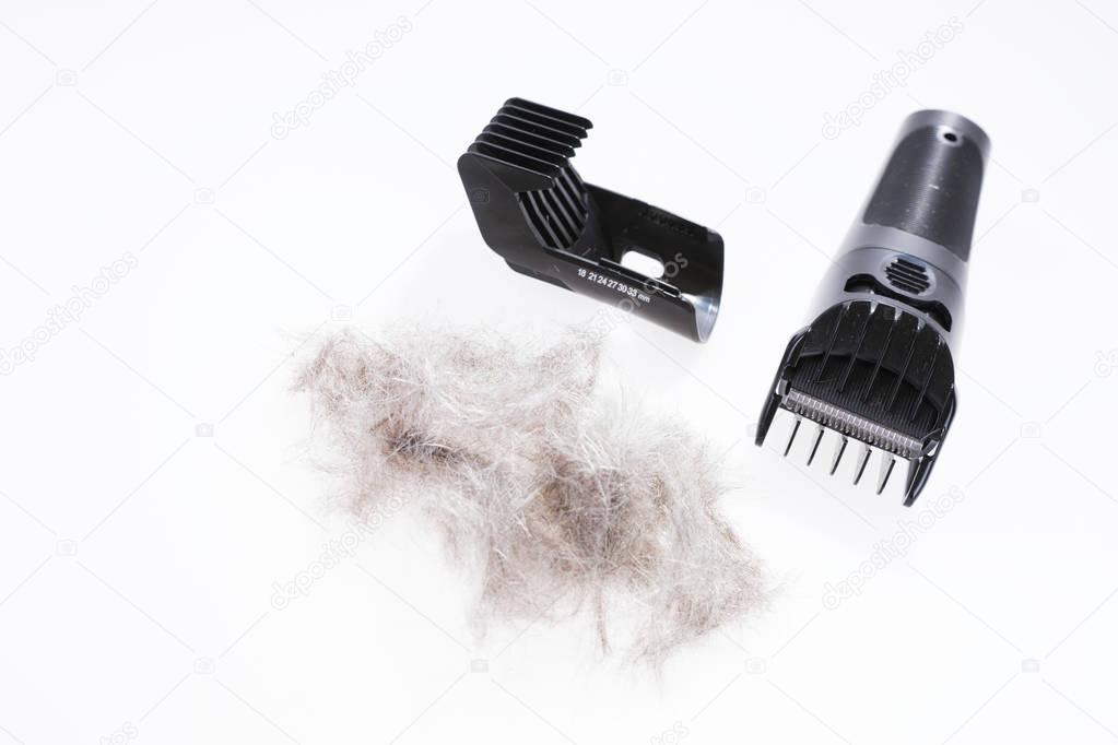 Hair cutting machine with gray hair isolated