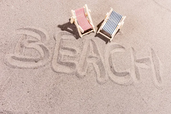 Strand Hintergrund, Wort Strand auf den Strand geschrieben — Stockfoto
