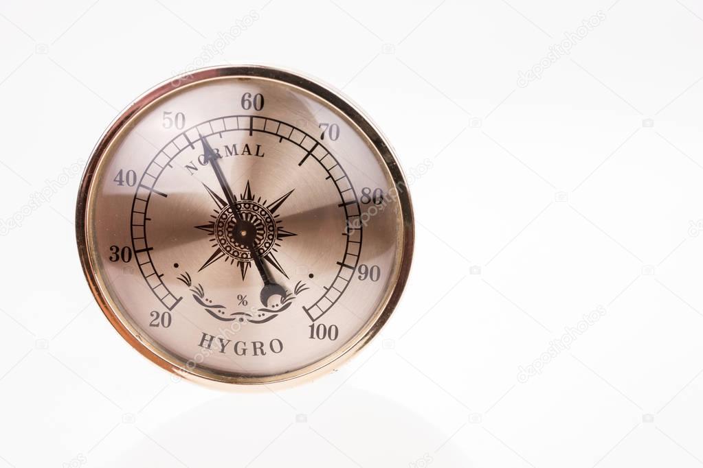 Vintage hygrometer isolated on white background