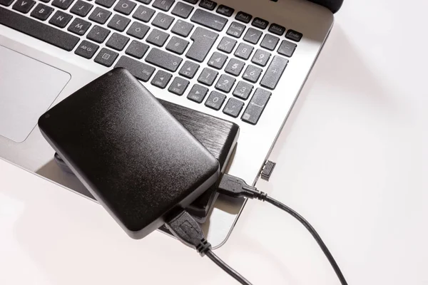 Two external or portable hard drive connected to laptop