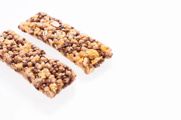 Two healthy granola bar (muesli or cereal bar) isolated on white — Stock Photo, Image