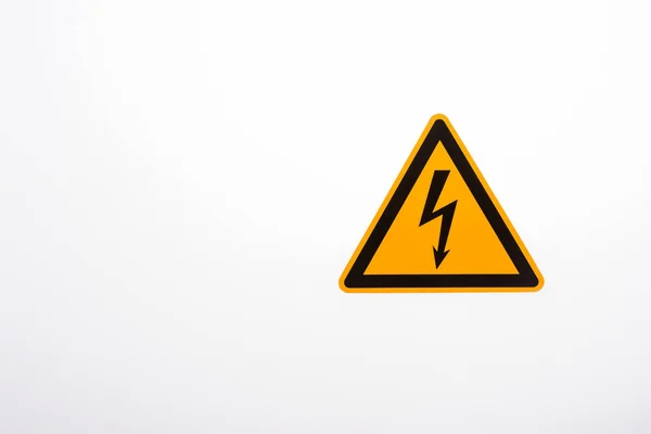 Señal de advertencia de triángulo amarillo de alto voltaje —  Fotos de Stock