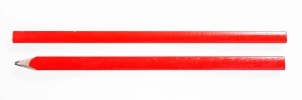 Dos lápices de construcción rojos aislados en blanco — Foto de Stock