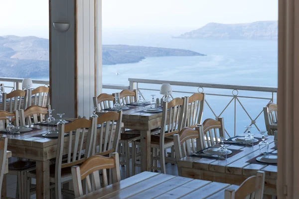 Empty restaurant with beautiful sea view in Fira