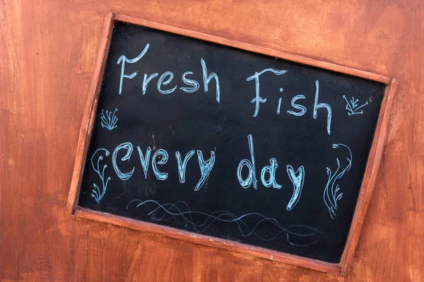 Handwritten sign - Fresh fish every day — Stock Photo, Image