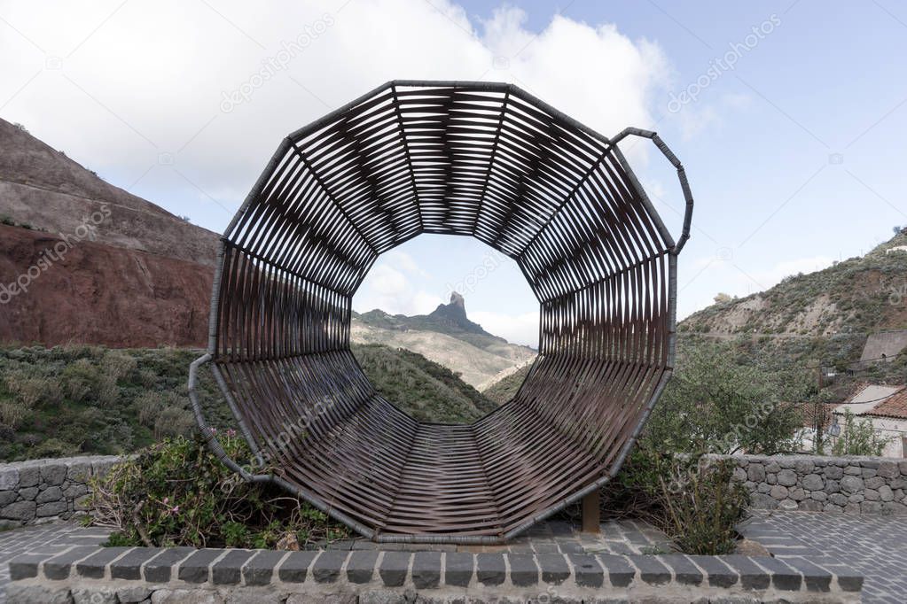 Roque Bentayga seen through a braided basket in Tejeda, Gran Canaria, Spain