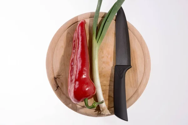 Paprika Spring Onion Black Knife Wooden Cutting Board — Stock Photo, Image