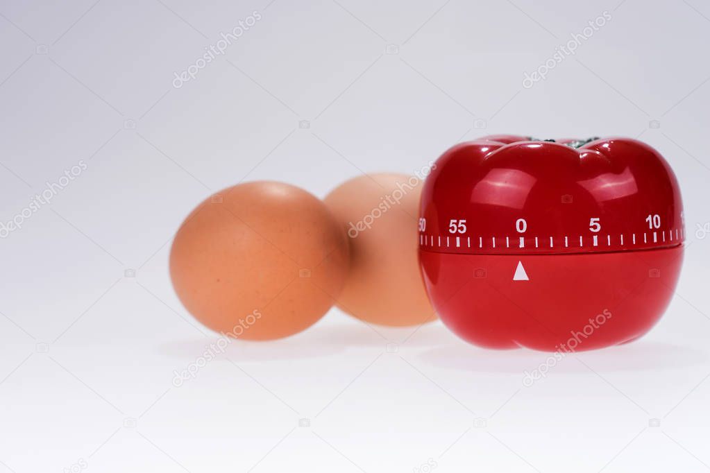 Egg timer mockup in the form of a tomato with two eggs
