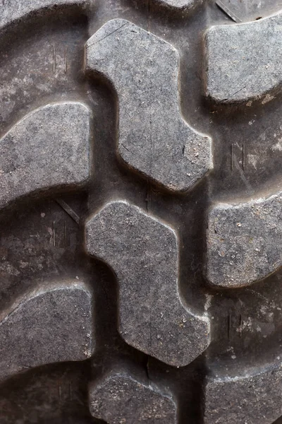 Closeup of a big tractor tire. Tire tread