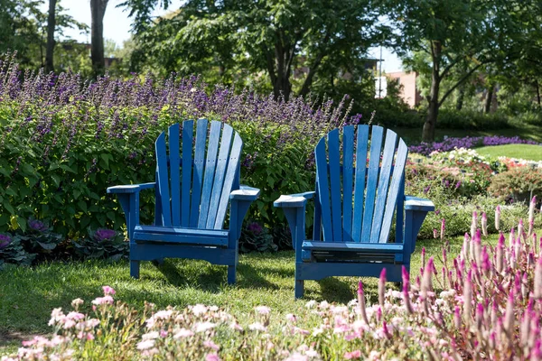 Empty blue chair in a park in Montreal.Canada