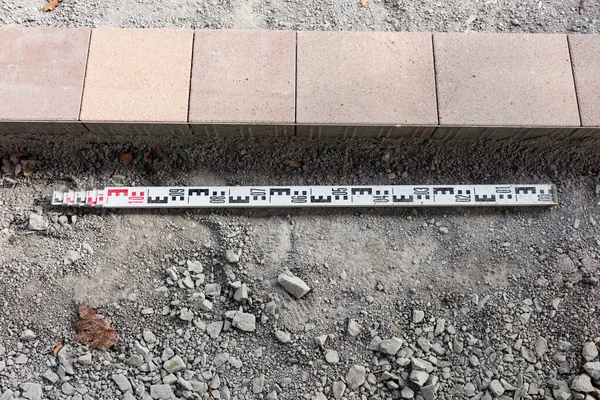 Novas Pedras Coloridas Pavimentação Medição Medidor Início Dos Trabalhos Construção — Fotografia de Stock