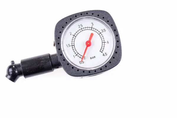 Pressure gauge for measuring air pressure in automobile tires isolated on white background