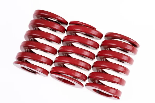 Closeup Three Red Strong Metal Springs Isolated White Background — Stock Photo, Image