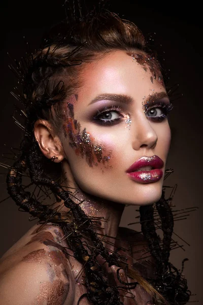 Fashion model with bright makeup and colorful glitter — Stock Photo, Image