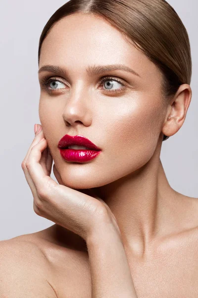 Beautiful young model with red lips — Stock Photo, Image