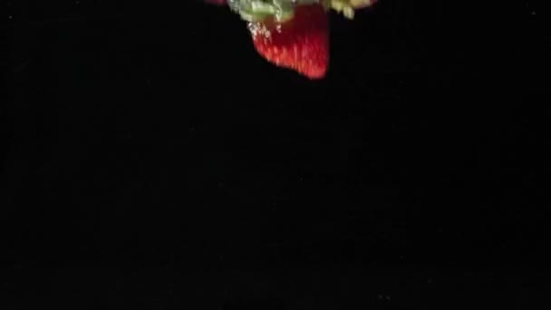 Fresh Healthy Food Strawberries Raspberries Blueberries Falling Water Black Background — Stock Video