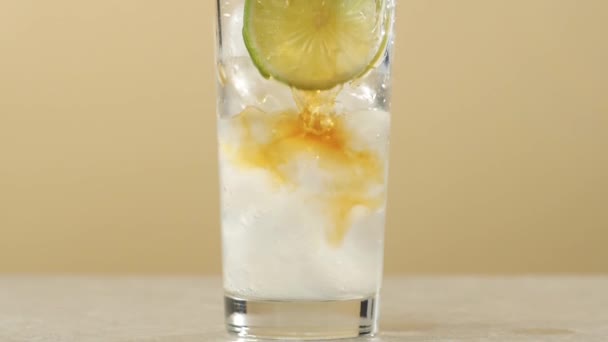 Tea Ceremony Iced Tea Poured Transparent Glass Ice Cubes Lime — Stock Video