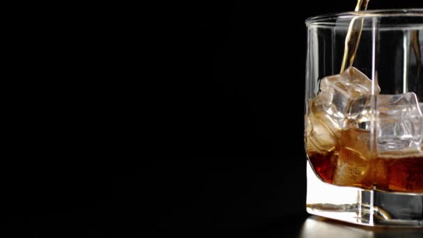 Tasty Cola Bubbles Poured Short Glass Ice Cubes Black Table — Stock Video