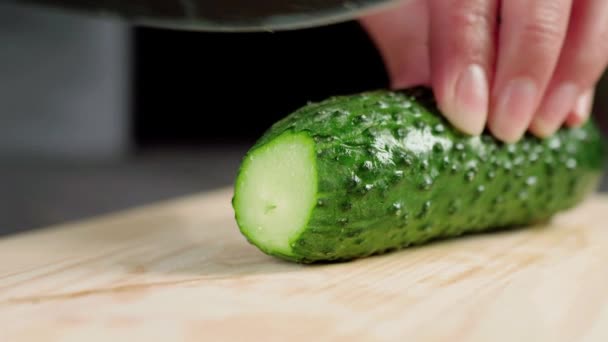 Woman Slices Sharp Shiny Knife Some Fresh Juicy Green Cucumbers — Stock Video