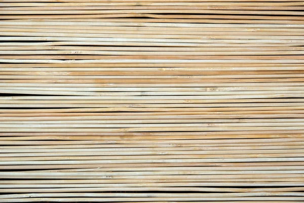 Uma cerca feita de ramos leves finos. Textura, fundo — Fotografia de Stock
