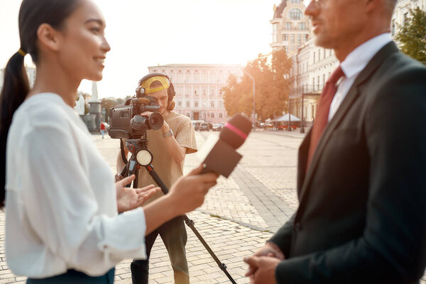 Now you know. Female journalist interviewing politician. Journalism industry, live streaming concept.