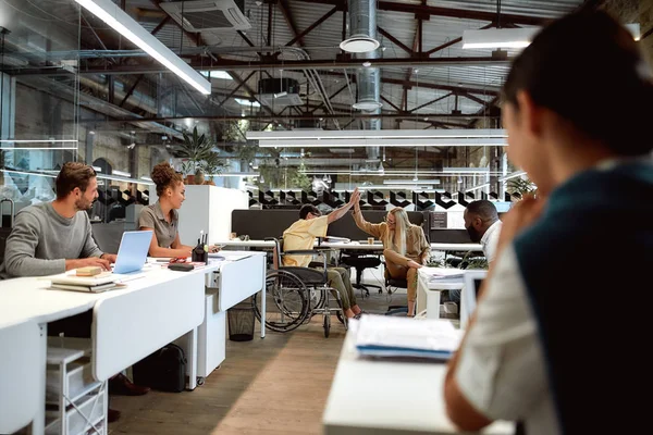 None of us is as smart as all of us. Creative multi ethnic business group at work — Stock Photo, Image