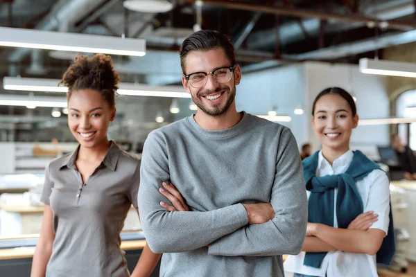 Add ingredient in your success. Young colleagues posing in office — Stockfoto