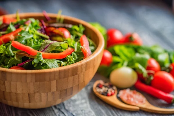 Fresh rustic vegetable salad on rustic background — Stock Photo, Image