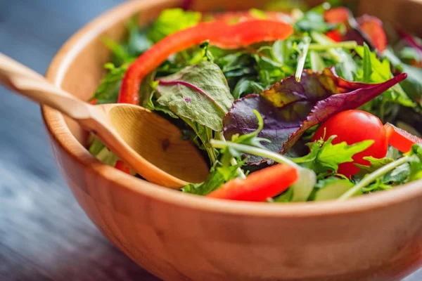 Fresh rustic vegetable salad on rustic background — Stock Photo, Image