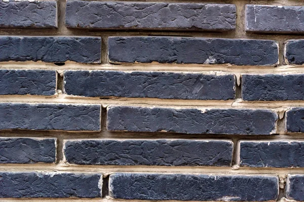Vieux mur de briques de pierre gris foncé — Photo