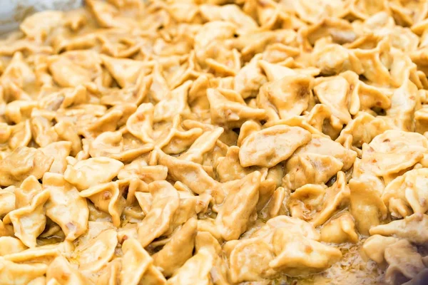 Close-up of meat dumplings or pelmeni — Stock Photo, Image