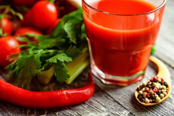 stock image Glass of tomato juice with fresh tomatoes